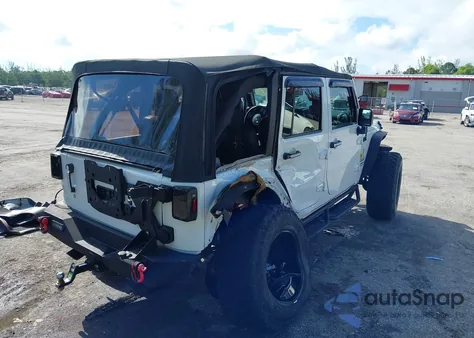 2015 Jeep Wrangler Unlimited Sport из США, поврежденный, VIN 1C4BJWDG1FL610304